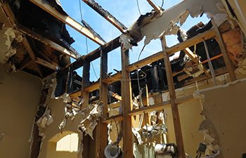 Fire damaged residential structure before electronics restoration
